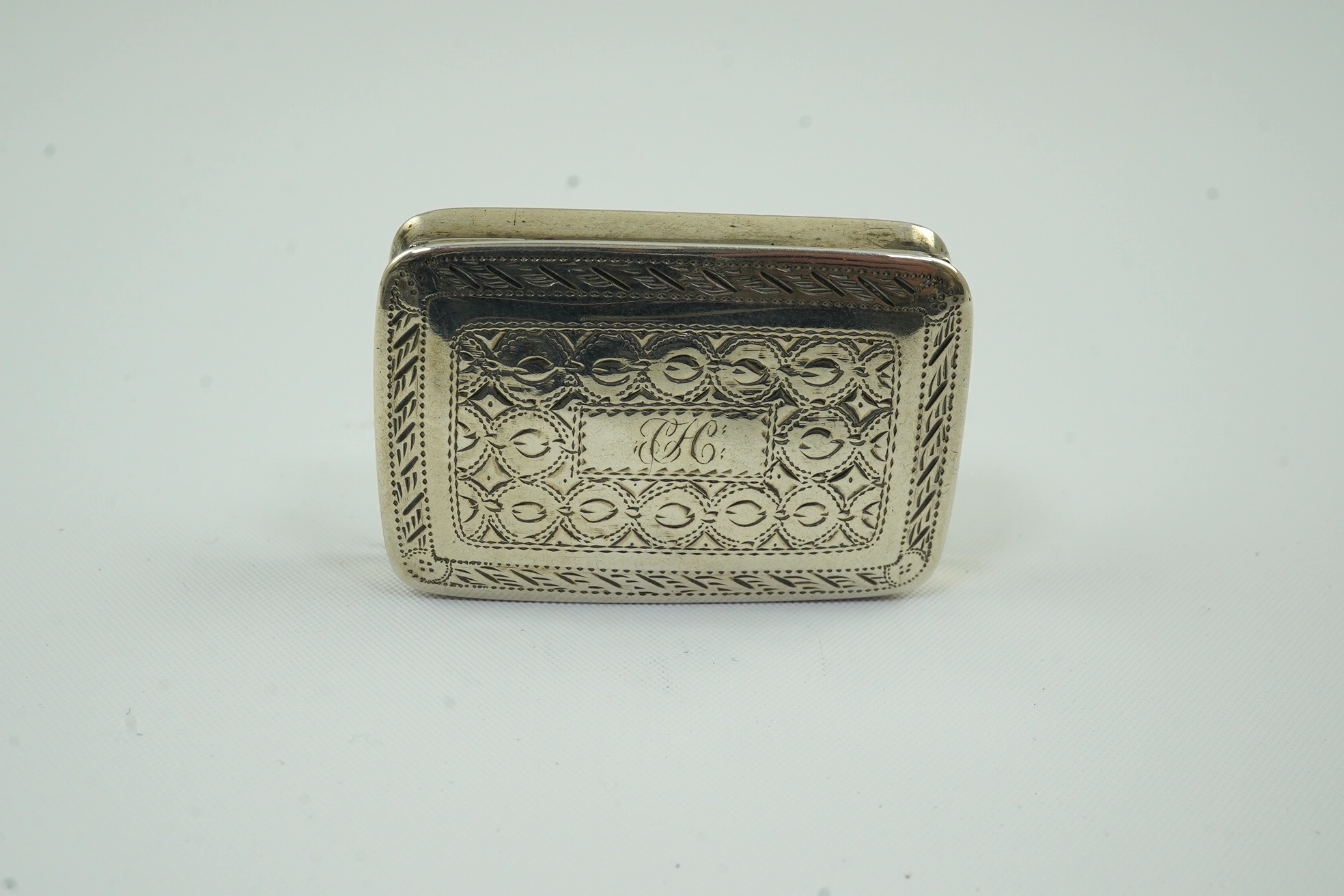 A William IV engraved silver vinaigrette by Nathaniel Mills